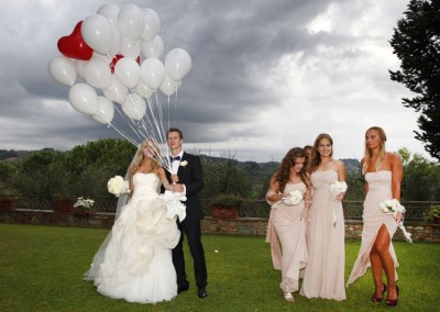 Bride and groom with balloons