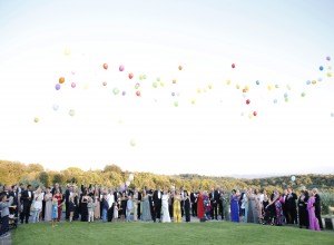 Bridal couple & guests with balloons