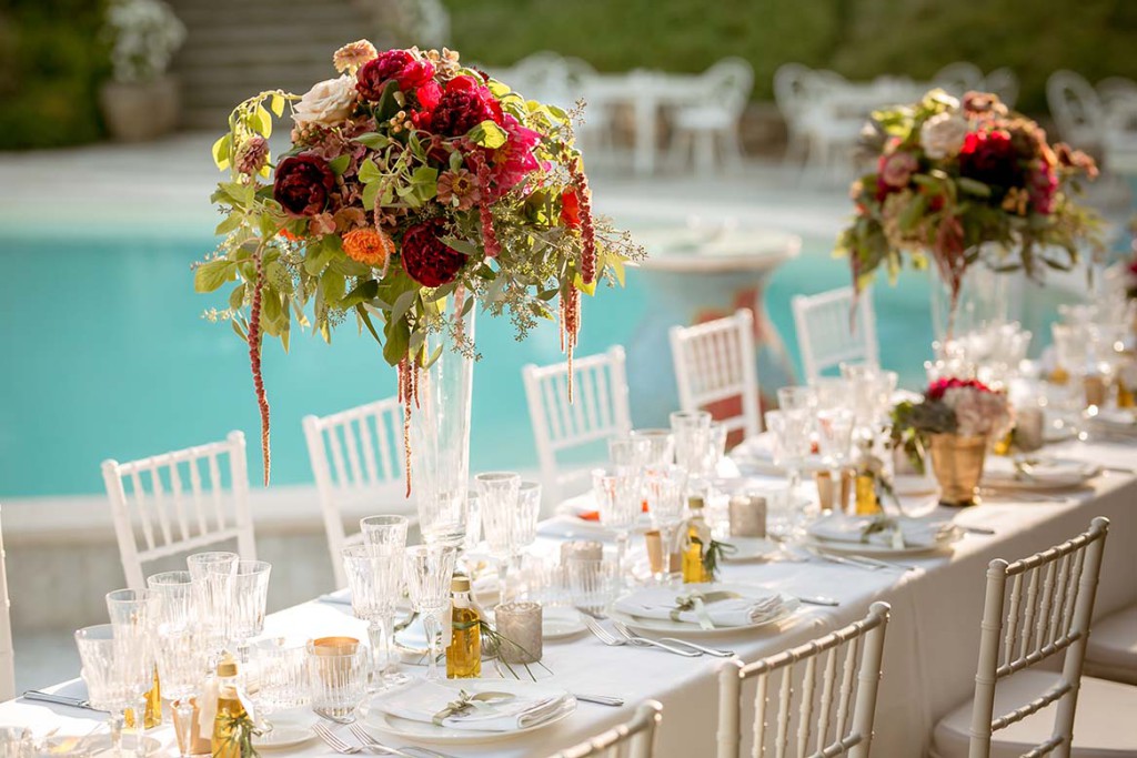 Wedding reception by the pool in Tuscany 