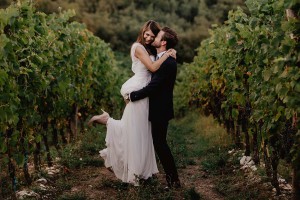 Couple in Tuscany in a vineyard