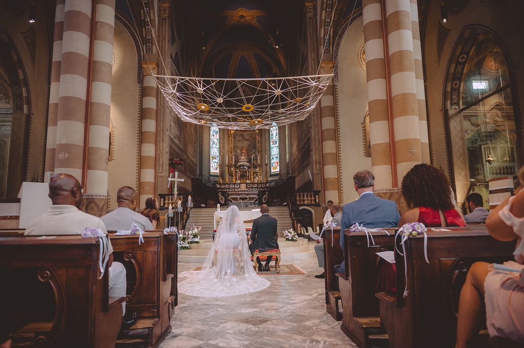 bridal couple during ceremony, Alba cathedral, Alba Piemont